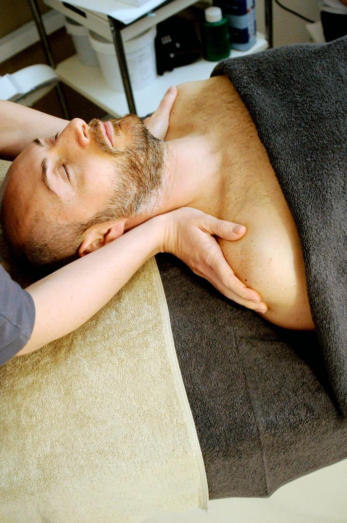 man being massaged